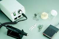 Figure 3: Grind away remaining burned material with a dental style Micro-Drill System with carbide ball mills.