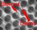 Figure 4: Void has caused the side of the BGA ball to "blow out" and deposit debris.