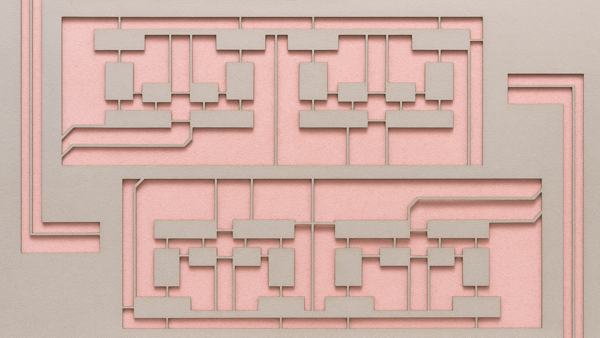 Figure 2 - New copper foil patterns prior to trimming and bonding to the circuit board surface. Two complete patterns are shown.